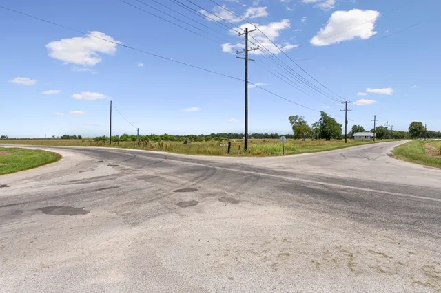 a view of a lake with a yard