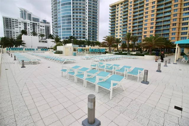 a view of a swimming pool with outdoor space