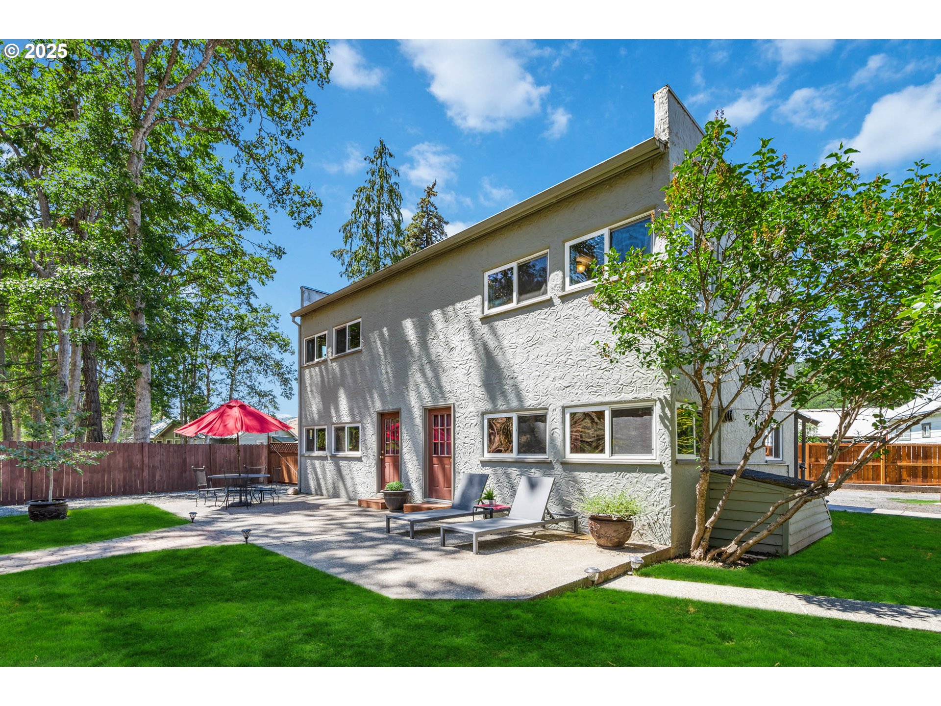 218 2nd Street Klickitat, WA 98628 - Photo 18 of 28 a view of house with backyard and outdoor seating