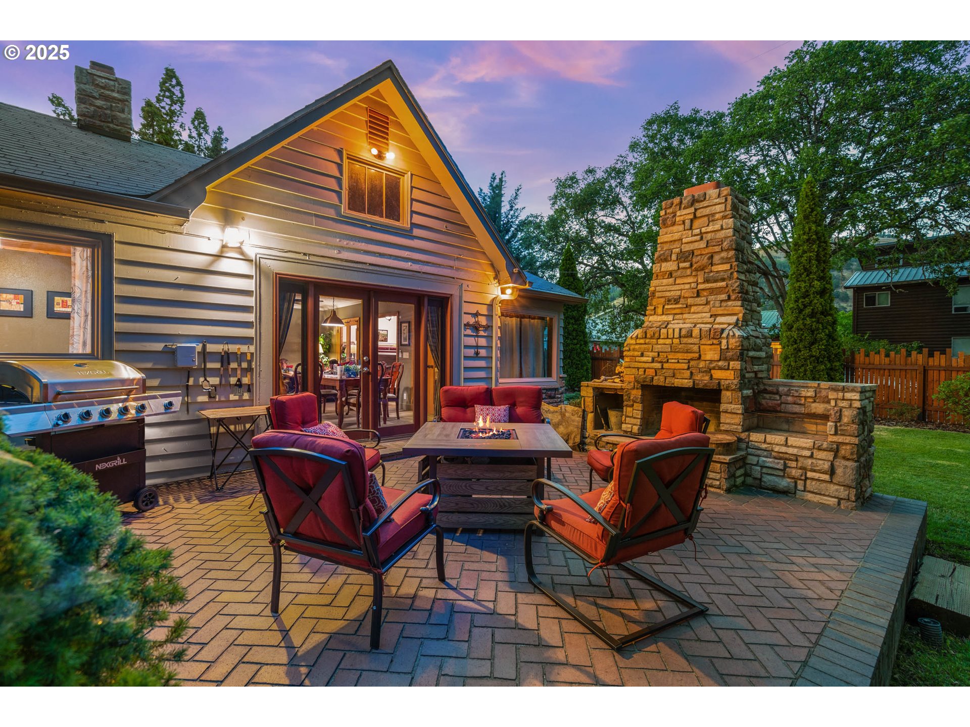 218 2nd Street Klickitat, WA 98628 - Photo 4 of 28 a view of a dinning table and chairs in the patio