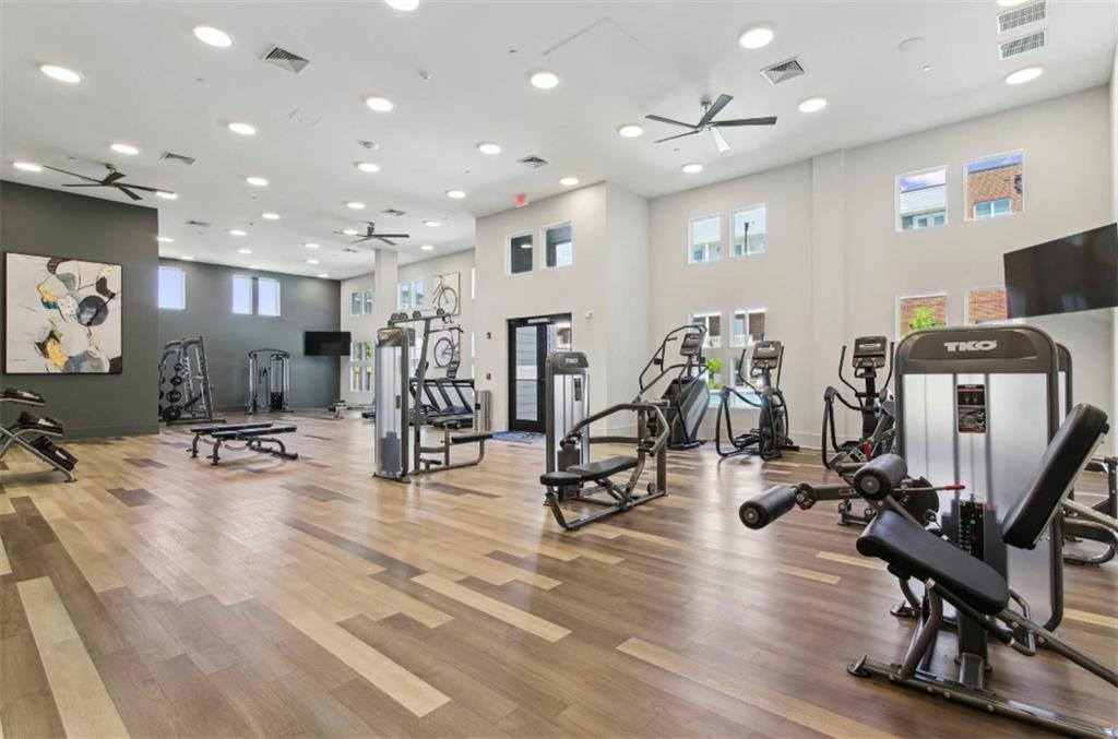 550 Webb Gin House Road, Unit 2406 Lawrenceville, GA 30045 - Photo 18 of 22 a view of a room with gym equipment