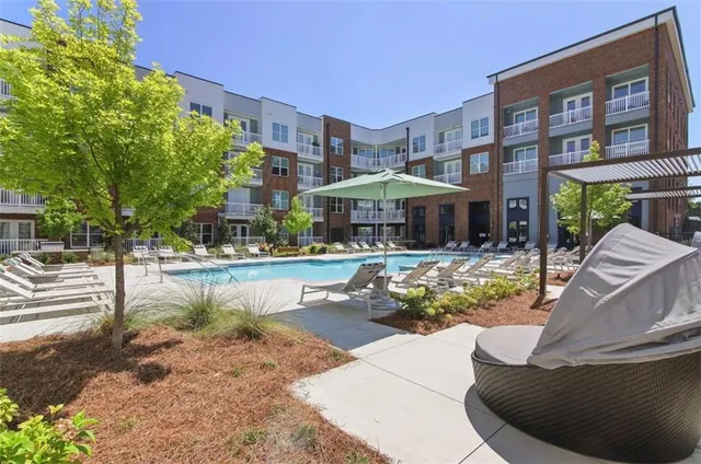 a view of a building with a patio