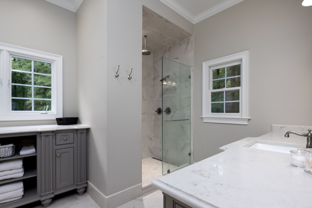 311 Double Churches Road, Unit 8 Columbus, GA 31904 - Photo 18 of 47 primary bathroom with 2 vanities + walk in shower