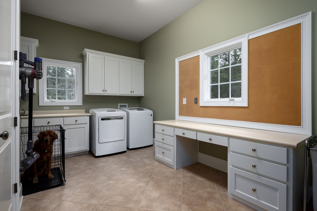 311 Double Churches Road, Unit 8 Columbus, GA 31904 - Photo 21 of 47 large laundry room with work desk and sink