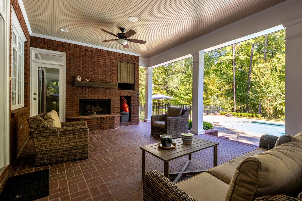 311 Double Churches Road, Unit 8 Columbus, GA 31904 - Photo 32 of 47 covered patio with fireplace