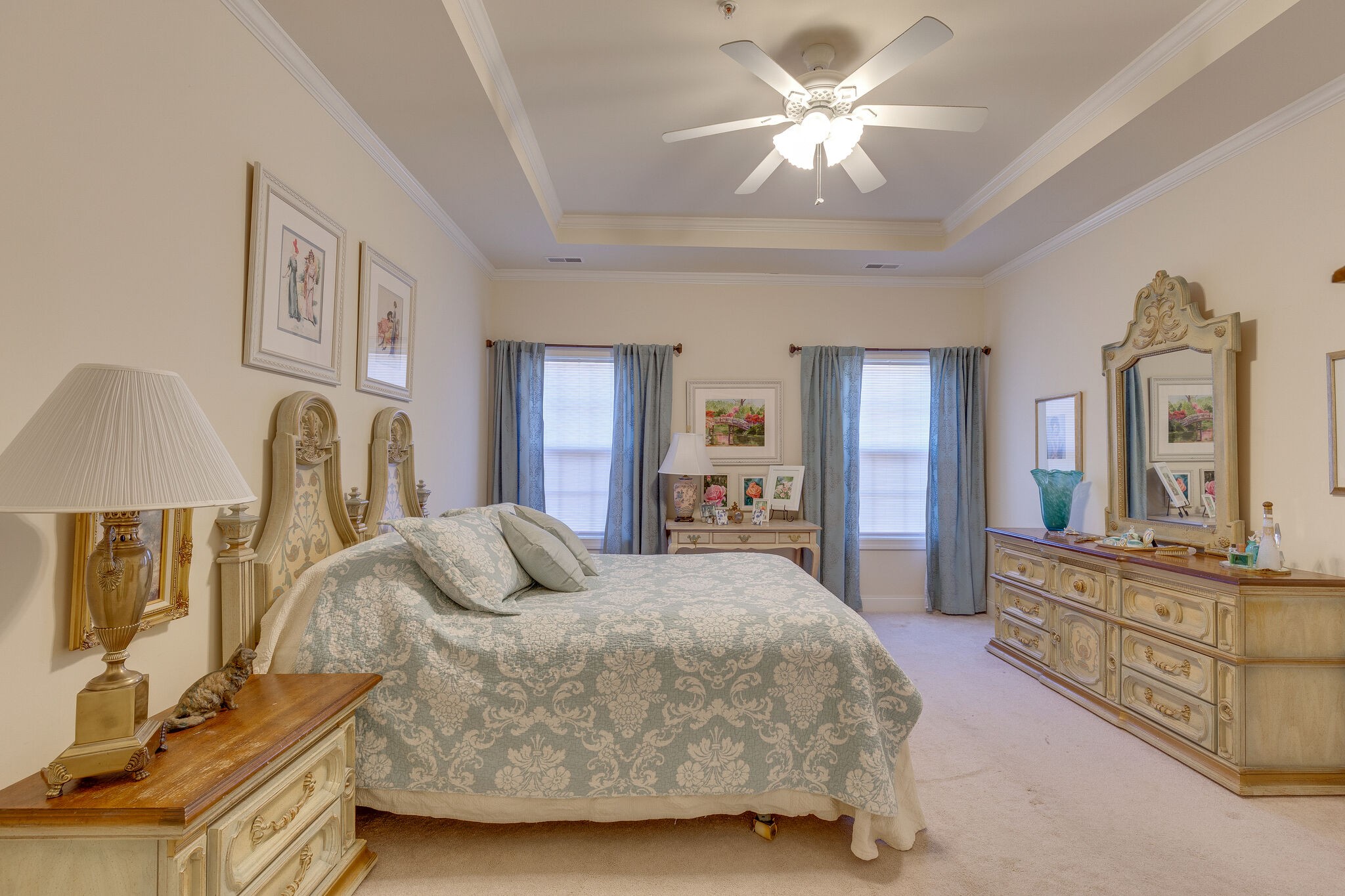 102 Westview Drive Spring Hill, TN 37174 - Photo 16 of 27 a bedroom with a bed and a chandelier