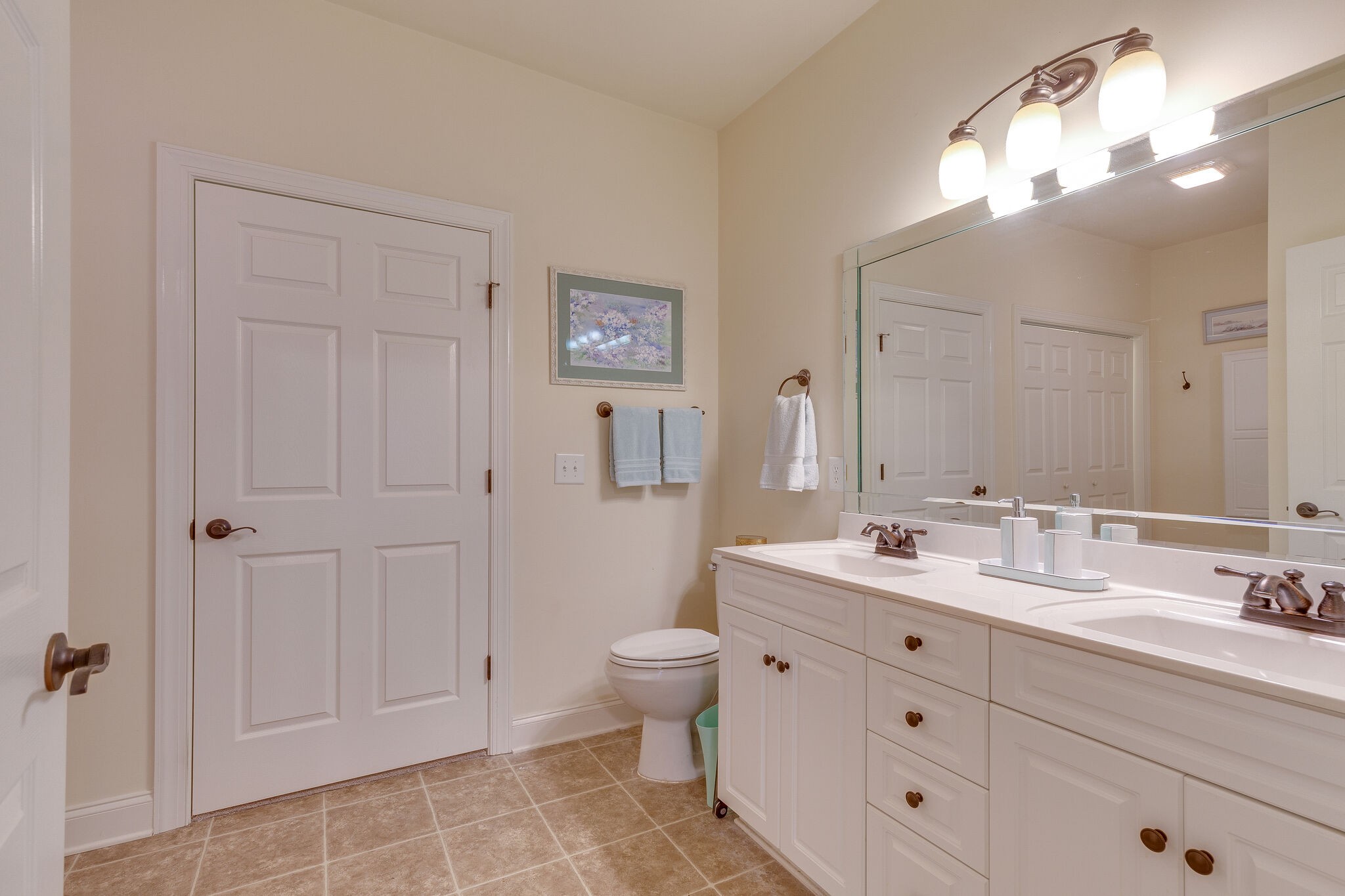 102 Westview Drive Spring Hill, TN 37174 - Photo 17 of 27 a bathroom with a double vanity sink mirror and toilet