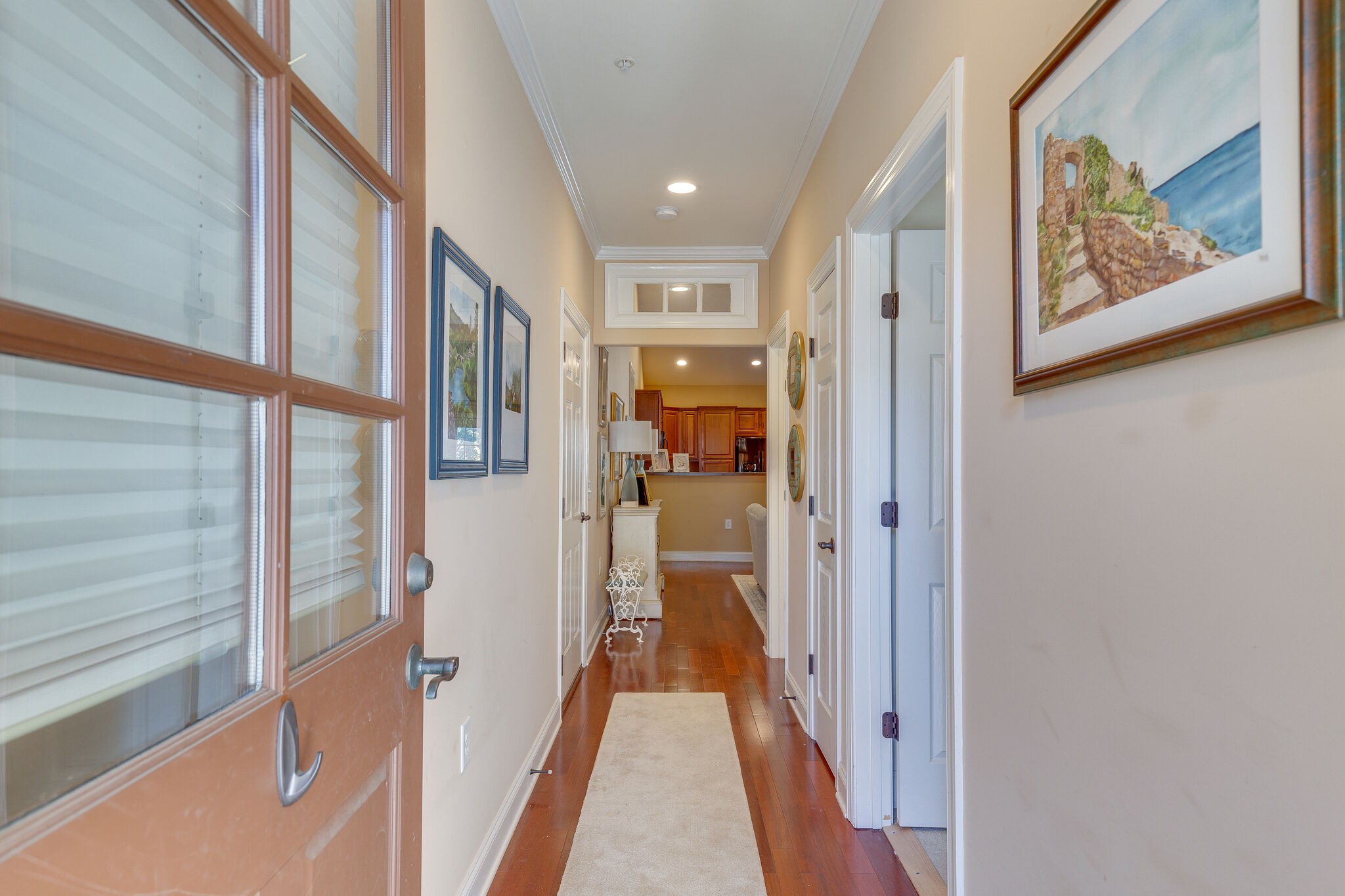 102 Westview Drive Spring Hill, TN 37174 - Photo 3 of 27 a view of a hallway with wooden floor and staircase