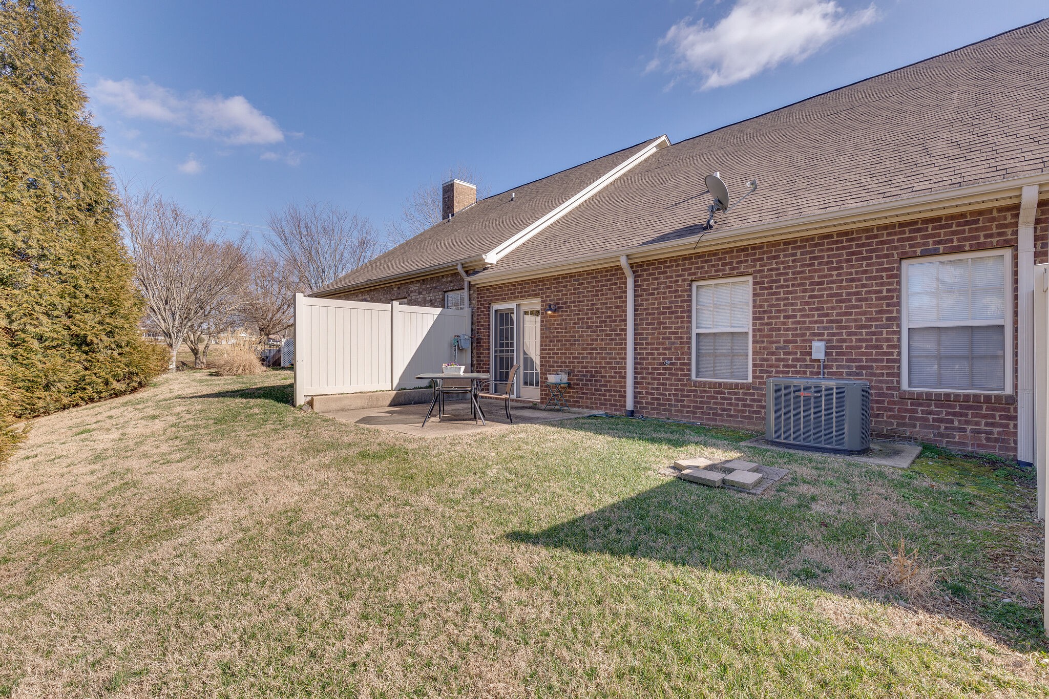 102 Westview Drive Spring Hill, TN 37174 - Photo 25 of 27 a view of a house with a yard and garage
