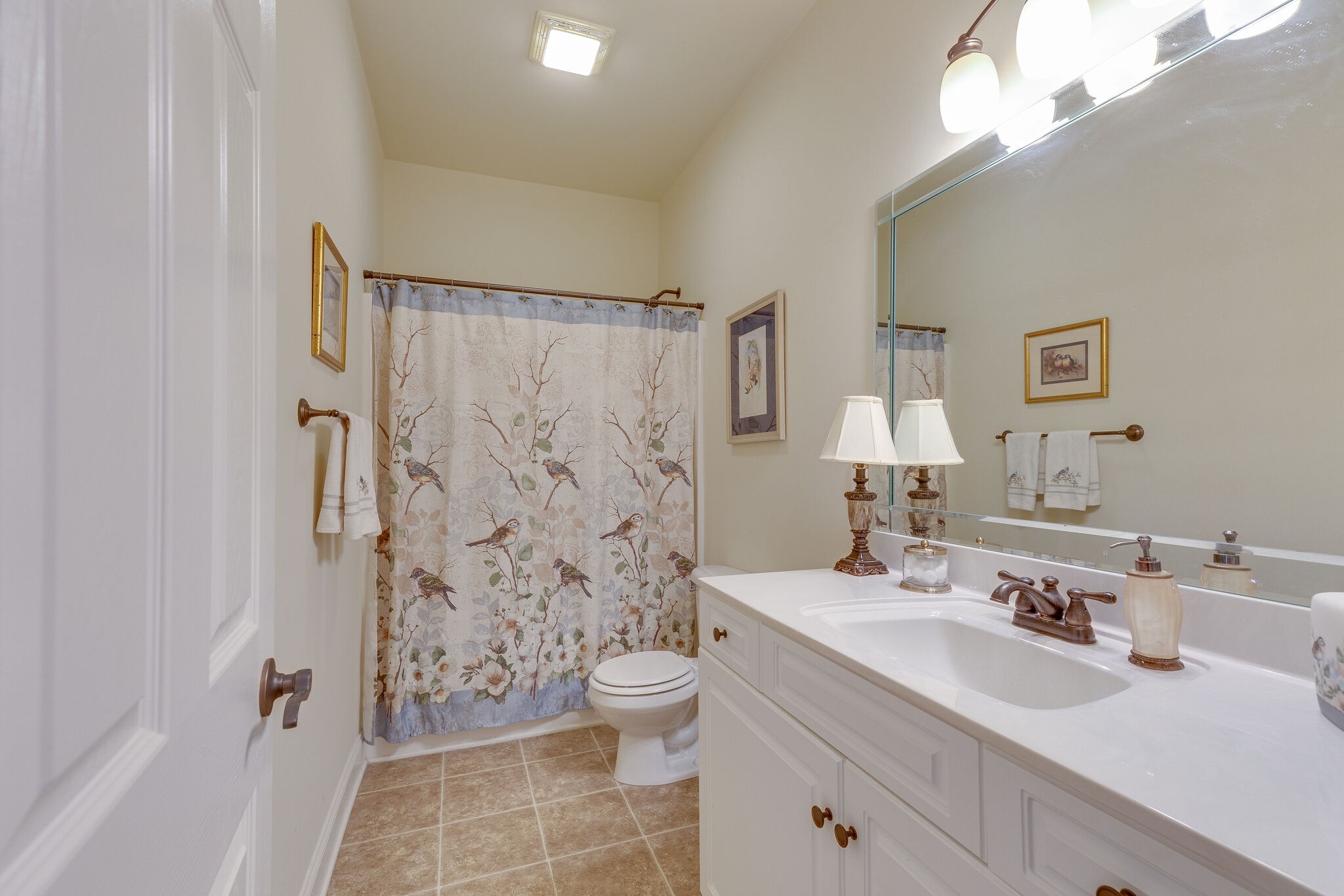 102 Westview Drive Spring Hill, TN 37174 - Photo 5 of 27 a bathroom with a sink toilet double vanity and shower
