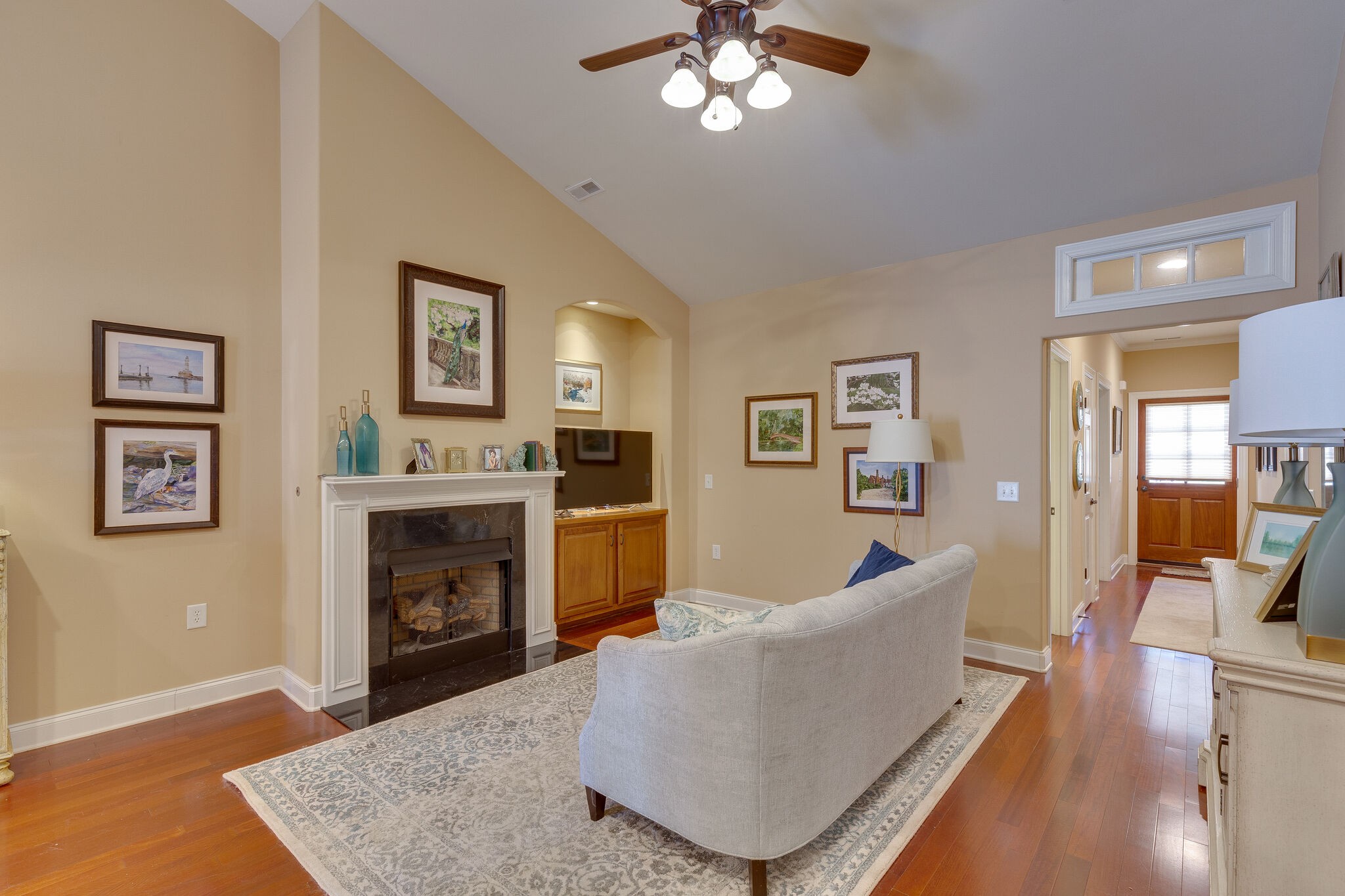 102 Westview Drive Spring Hill, TN 37174 - Photo 7 of 27 a living room with furniture and a fireplace