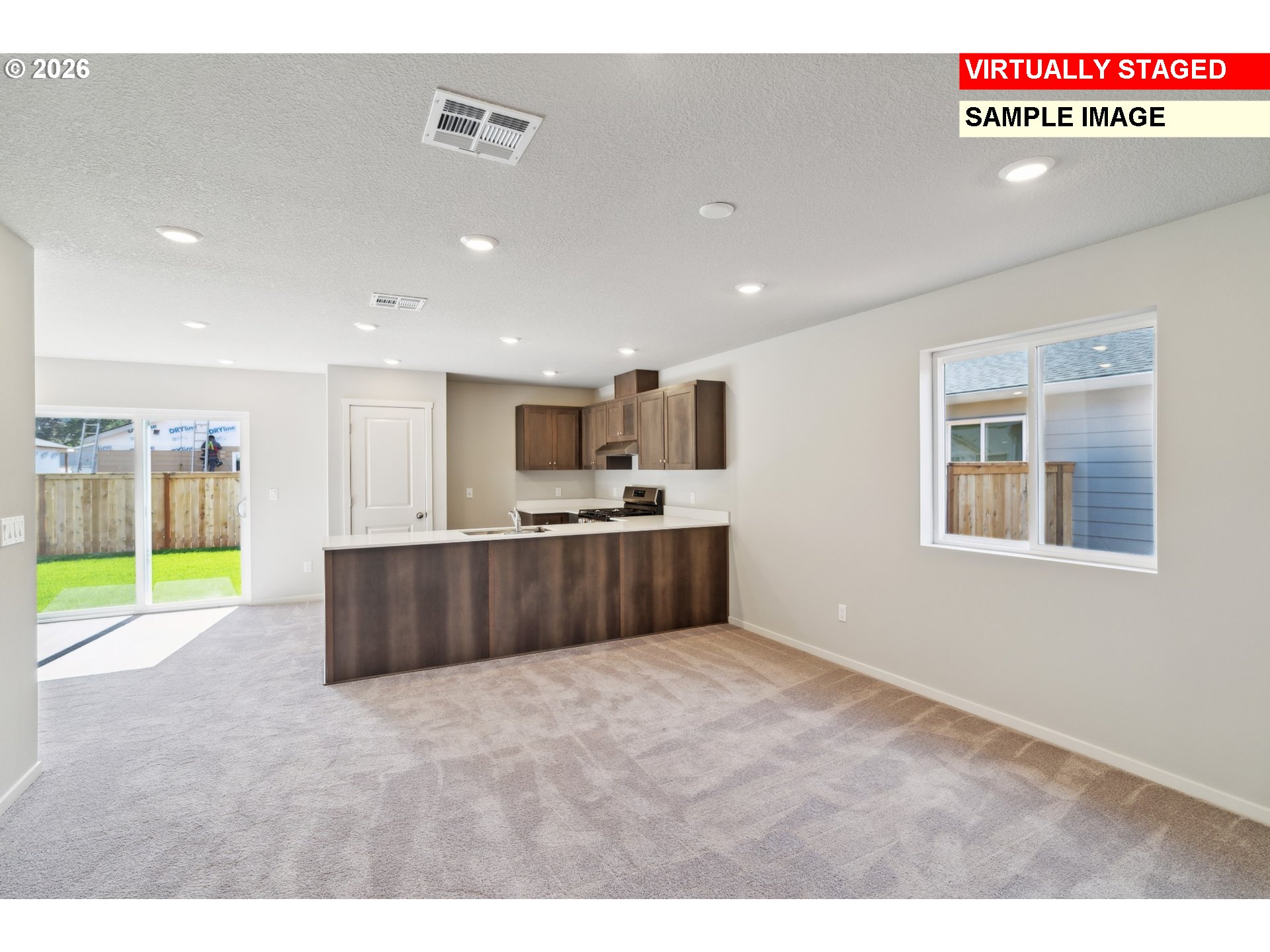 25229 Todd Way Veneta, OR 97487 - Photo 8 of 29 a view of an empty room with kitchen natural light