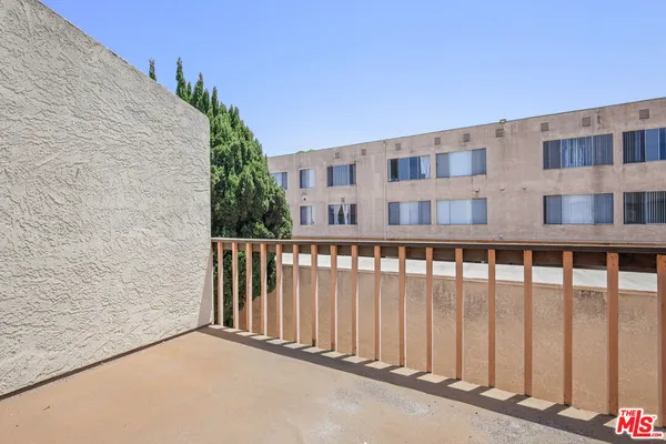 a view of a building from a balcony