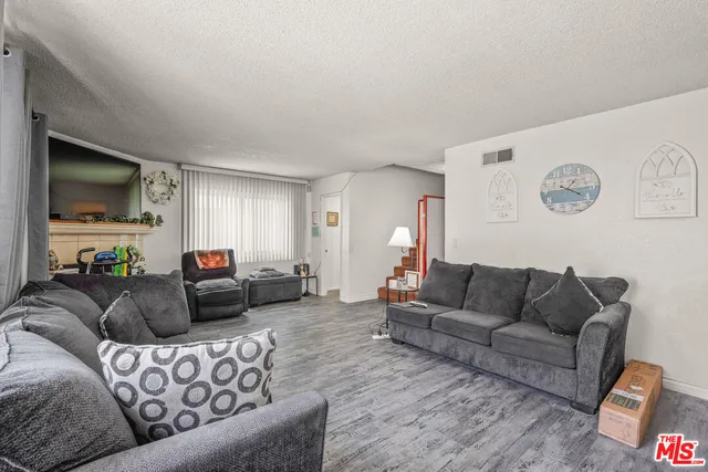 a living room with furniture and a couch