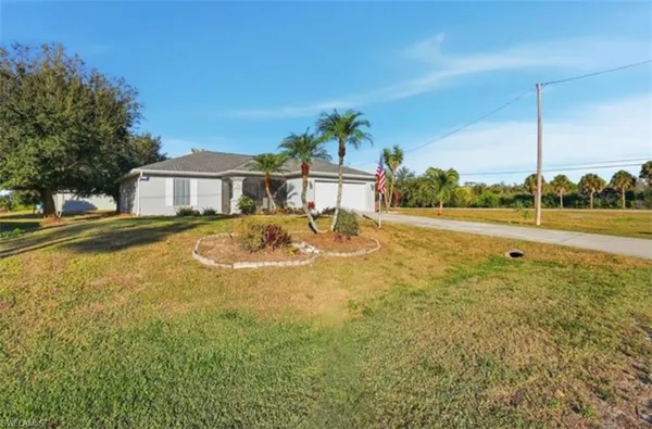 a view of a house with a swimming pool