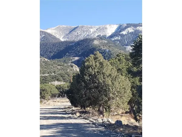 a view of a house with a mountain