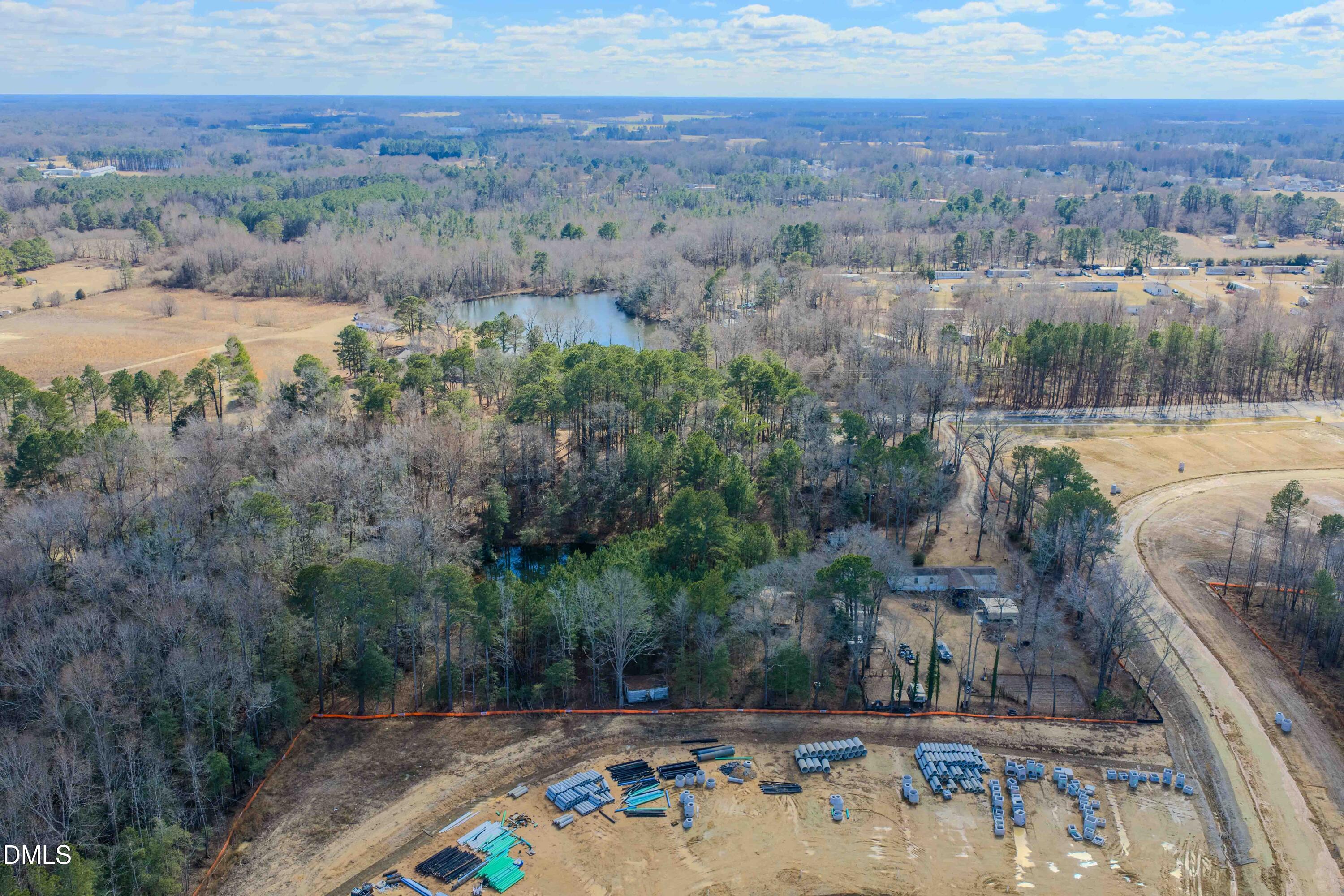 6724 Wimberly Road Willow Spring, NC 27592 - Photo 12 of 36 an aerial view of a house with outdoor space