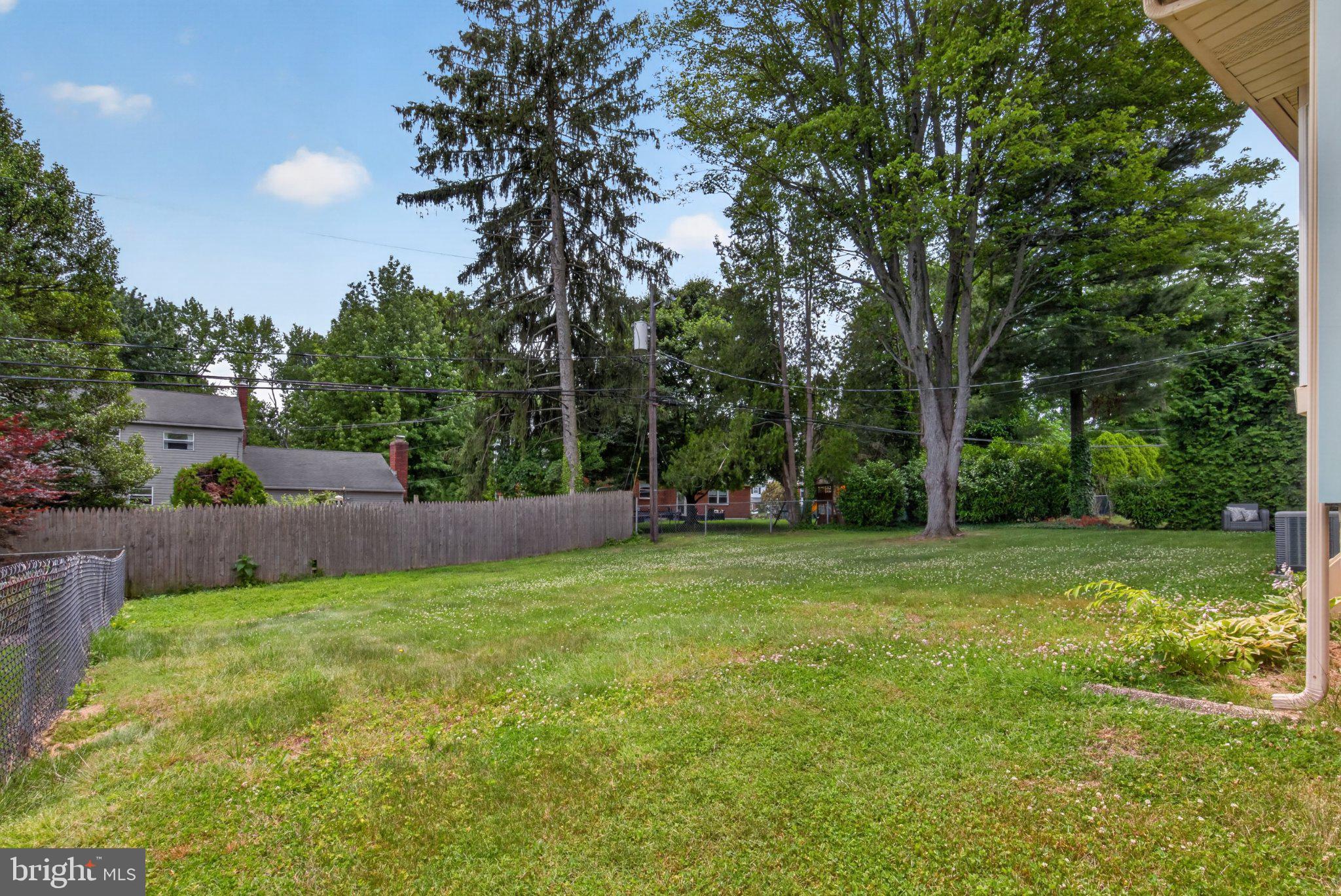 1020 Jeffrey Road Wilmington, DE 19810 - Photo 103 of 108 Spacious backyard with lush greenery.