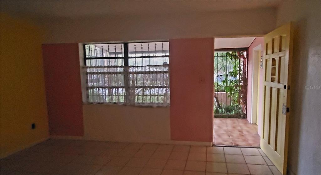 2208 Valencia Road Orlando, FL 32803 - Photo 11 of 45 a view of a room that has a window in it