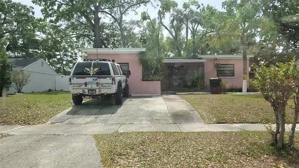 2208 Valencia Road Orlando, FL 32803 - Photo 2 of 45 a view of a house with a yard and large tree