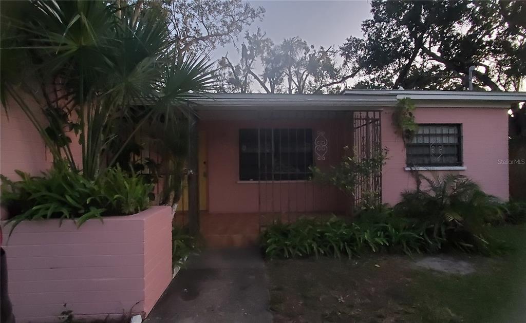 2208 Valencia Road Orlando, FL 32803 - Photo 4 of 45 a couple of potted plants in front of house