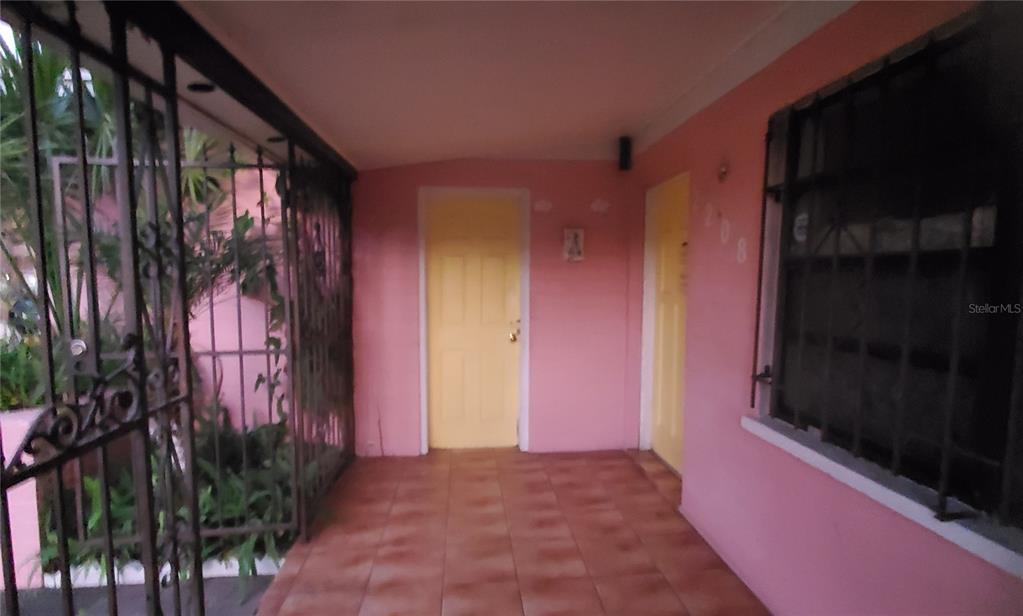 2208 Valencia Road Orlando, FL 32803 - Photo 6 of 45 a view of a house with a yard