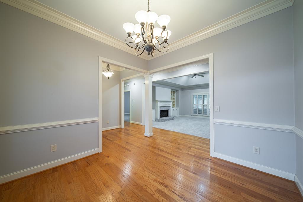 4571 Carnoustie Lane Columbus, GA 31909 - Photo 14 of 49 a view of an empty room with window and wooden floor
