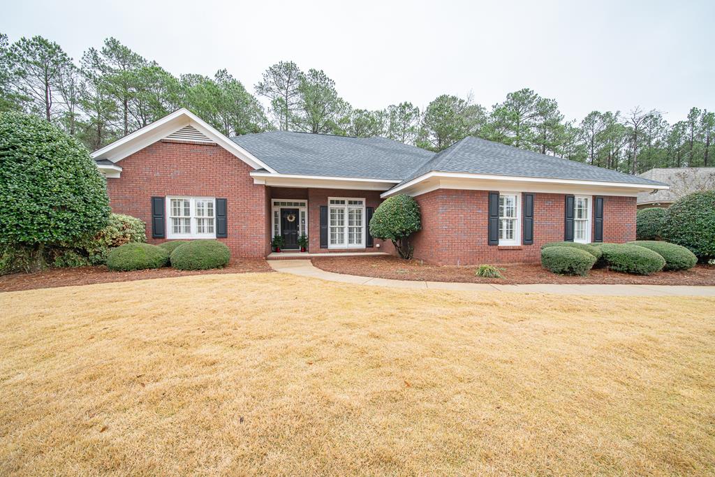 4571 Carnoustie Lane Columbus, GA 31909 - Photo 3 of 49 a front view of a house with yard and trees