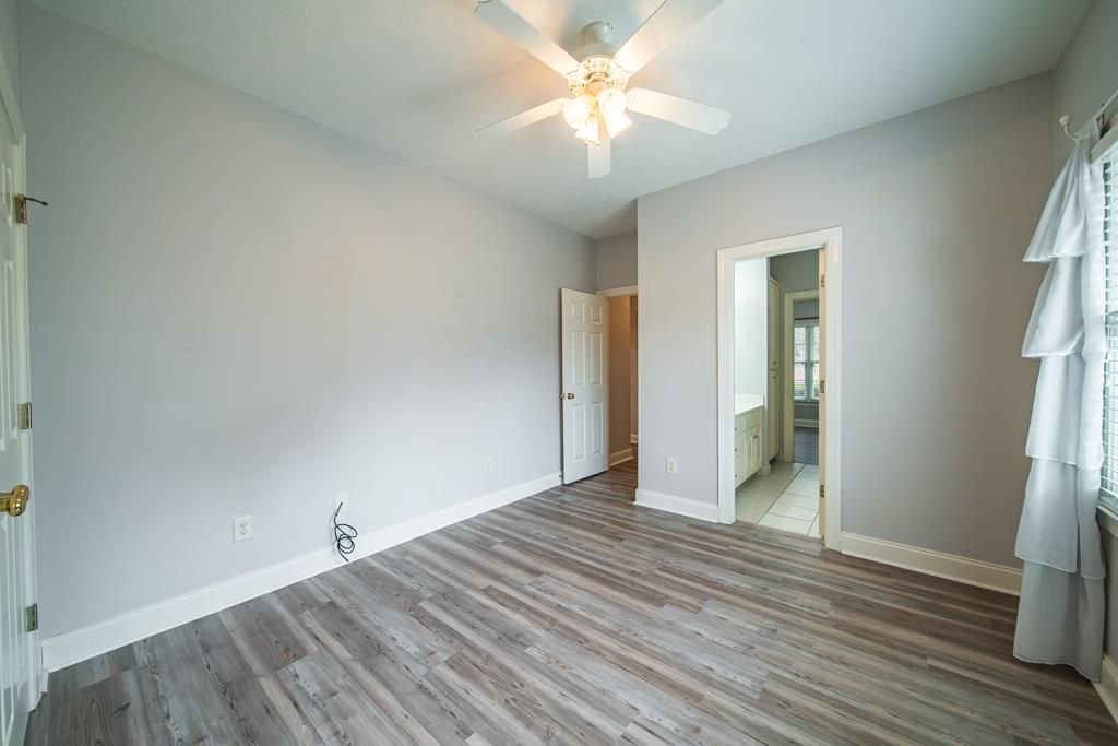 4571 Carnoustie Lane Columbus, GA 31909 - Photo 34 of 49 wooden floor in an empty room with a window