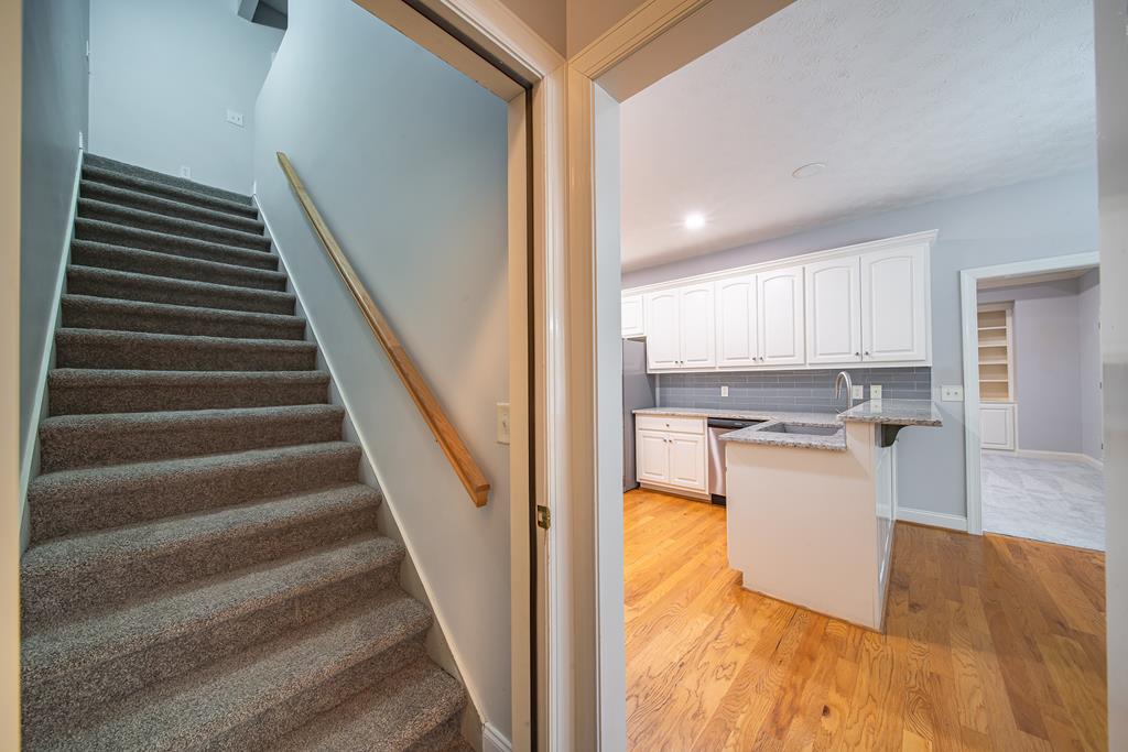 4571 Carnoustie Lane Columbus, GA 31909 - Photo 35 of 49 a view of kitchen and kitchen with wooden floor