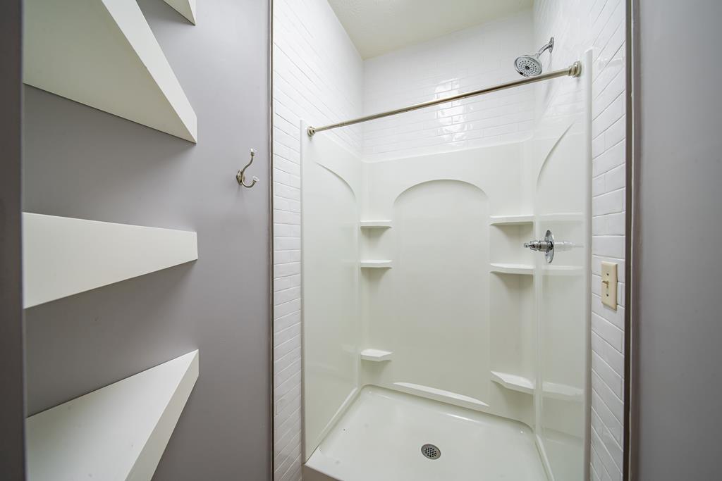 4571 Carnoustie Lane Columbus, GA 31909 - Photo 39 of 49 a bathroom with a shower