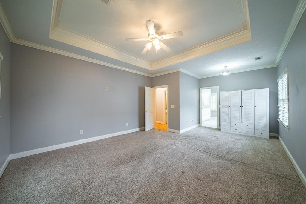 4571 Carnoustie Lane Columbus, GA 31909 - Photo 42 of 49 a view of an empty room with a ceiling fan