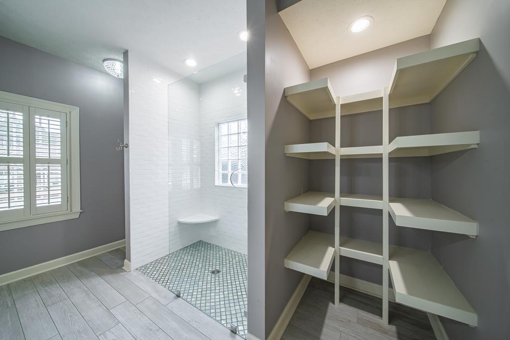 4571 Carnoustie Lane Columbus, GA 31909 - Photo 44 of 49 a view of walk in closet with empty racks