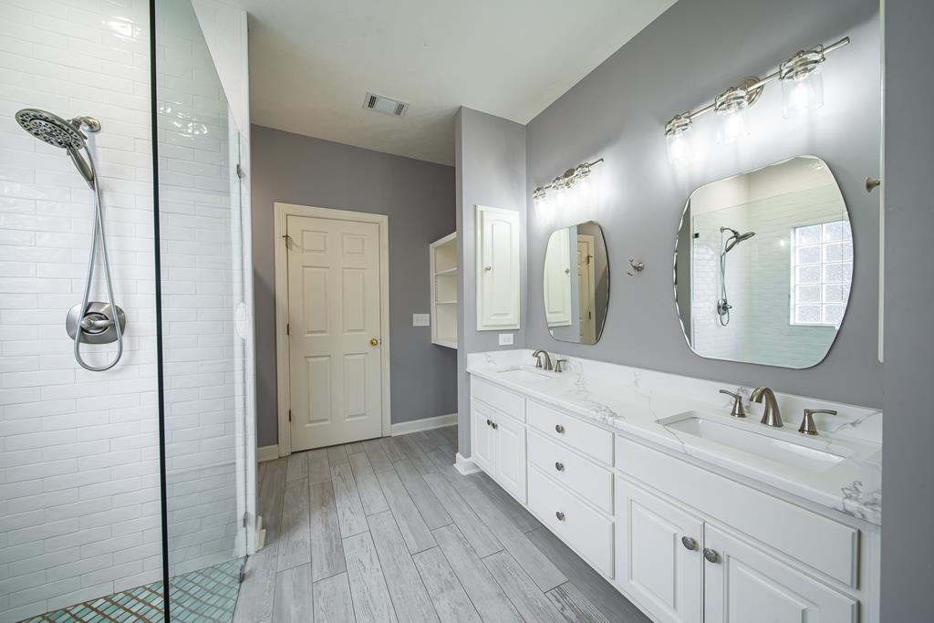 4571 Carnoustie Lane Columbus, GA 31909 - Photo 47 of 49 a spacious bathroom with a double vanity sink double and a mirror