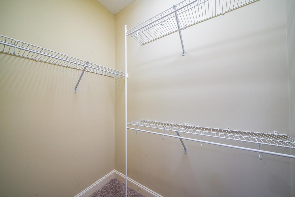 4571 Carnoustie Lane Columbus, GA 31909 - Photo 48 of 49 a view of a room with racks on the wall