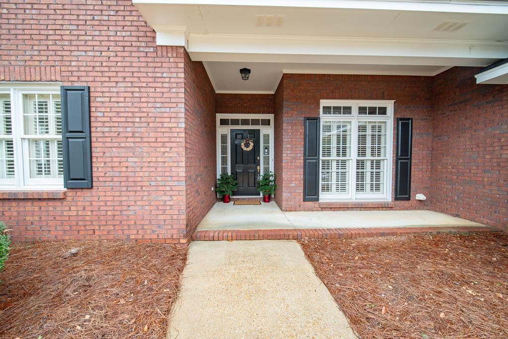 4571 Carnoustie Lane Columbus, GA 31909 - Photo 5 of 49 a view of a brick house with a large window