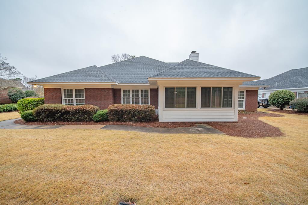 4571 Carnoustie Lane Columbus, GA 31909 - Photo 9 of 49 a front view of a house with a yard