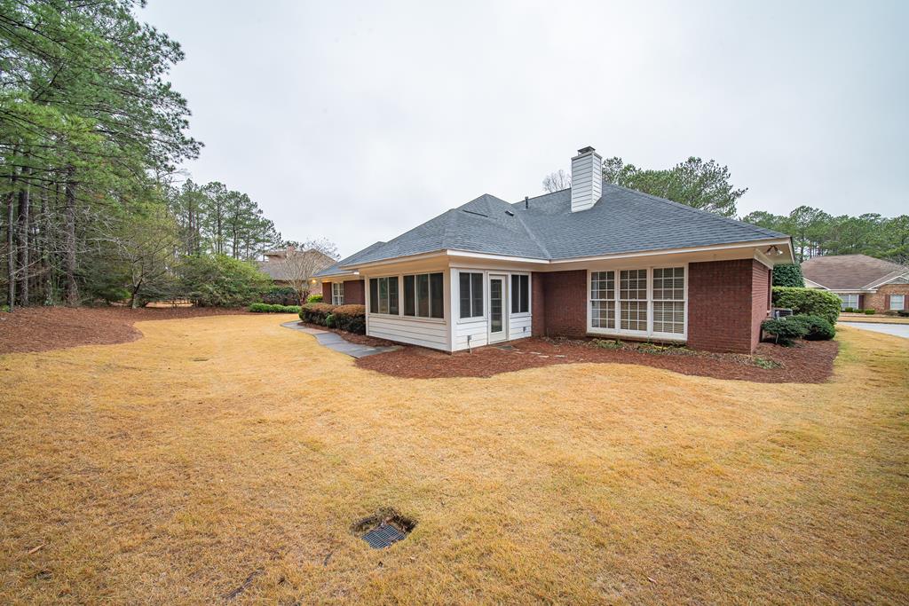 4571 Carnoustie Lane Columbus, GA 31909 - Photo 10 of 49 a view of a house with a yard and sitting area