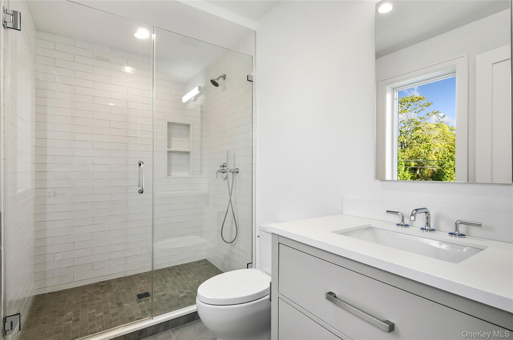 135 South Road Westhampton, NY 11977 - Photo 29 of 38 a bathroom with a granite countertop sink toilet and shower