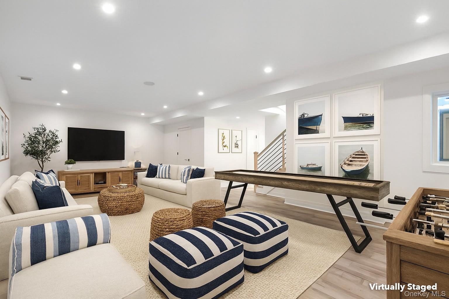 135 South Road Westhampton, NY 11977 - Photo 32 of 38 a living room with furniture and a flat screen tv
