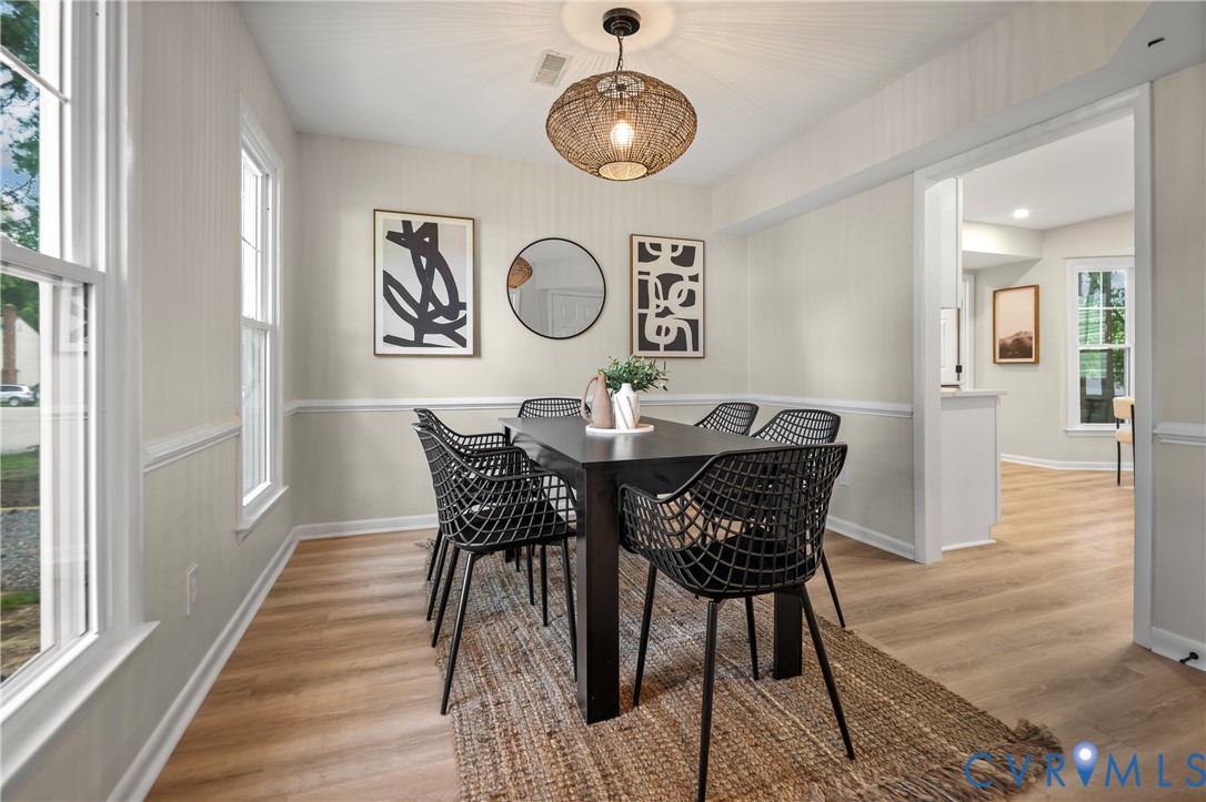 8928 Hawkbill Road North Chesterfield, VA 23237 - Photo 13 of 50 Light wood-finish flooring, white chair rail moldi