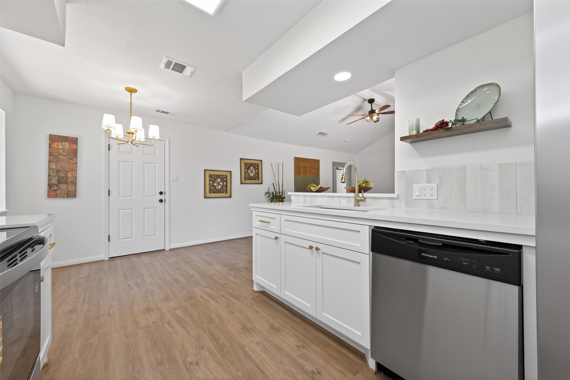 503 Allison Street Conroe, TX 77303 - Photo 11 of 34 Elegant, modern kitchen with brand-new cabinets.