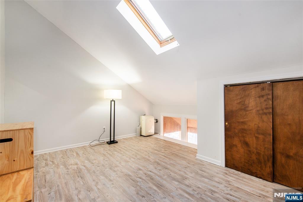 15 Village Way, Unit 5 Vernon, NJ 07462 - Photo 19 of 22 a view of a room with wooden floor
