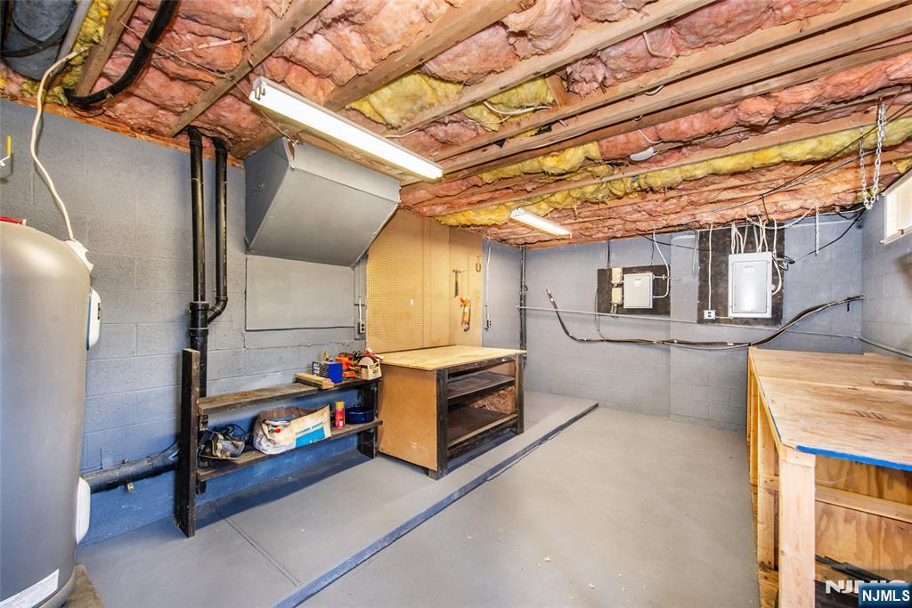15 Village Way, Unit 5 Vernon, NJ 07462 - Photo 22 of 22 a storage room with washer and dryer