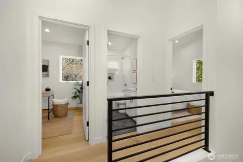 a bedroom with bed and a table