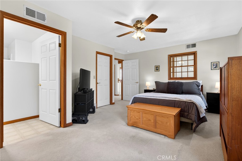 15185 Rancheria Creek Road Caliente, CA 93518 - Photo 20 of 54 a bed room with a bed and a ceiling fan
