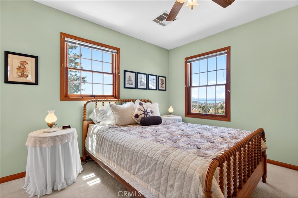 15185 Rancheria Creek Road Caliente, CA 93518 - Photo 25 of 54 a bedroom with a large bed and a window
