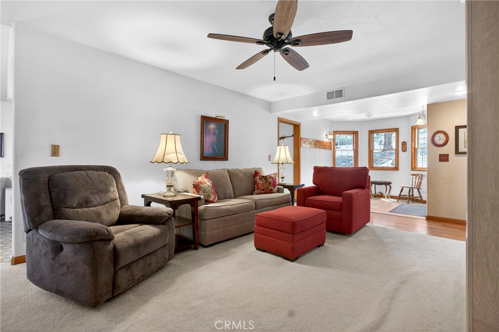 15185 Rancheria Creek Road Caliente, CA 93518 - Photo 35 of 54 a living room with furniture a ceiling fan and a rug
