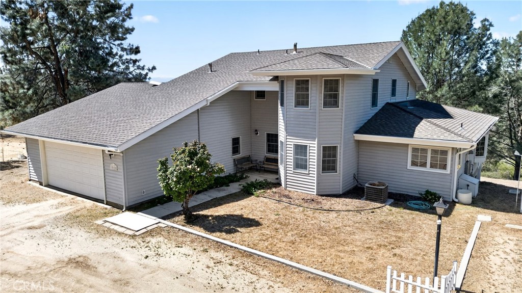 15185 Rancheria Creek Road Caliente, CA 93518 - Photo 47 of 54 a front view of a house with a yard and garage