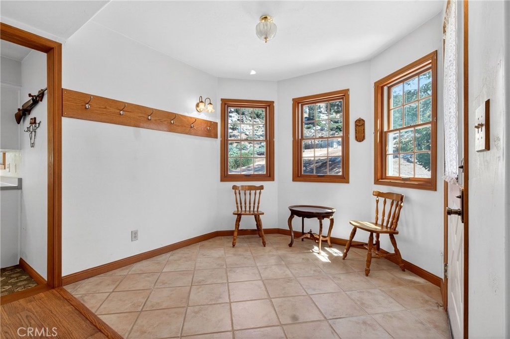 15185 Rancheria Creek Road Caliente, CA 93518 - Photo 5 of 54 a view of an empty room with window and furniture